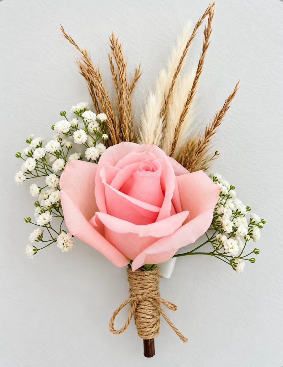 Pink floral boutonnière